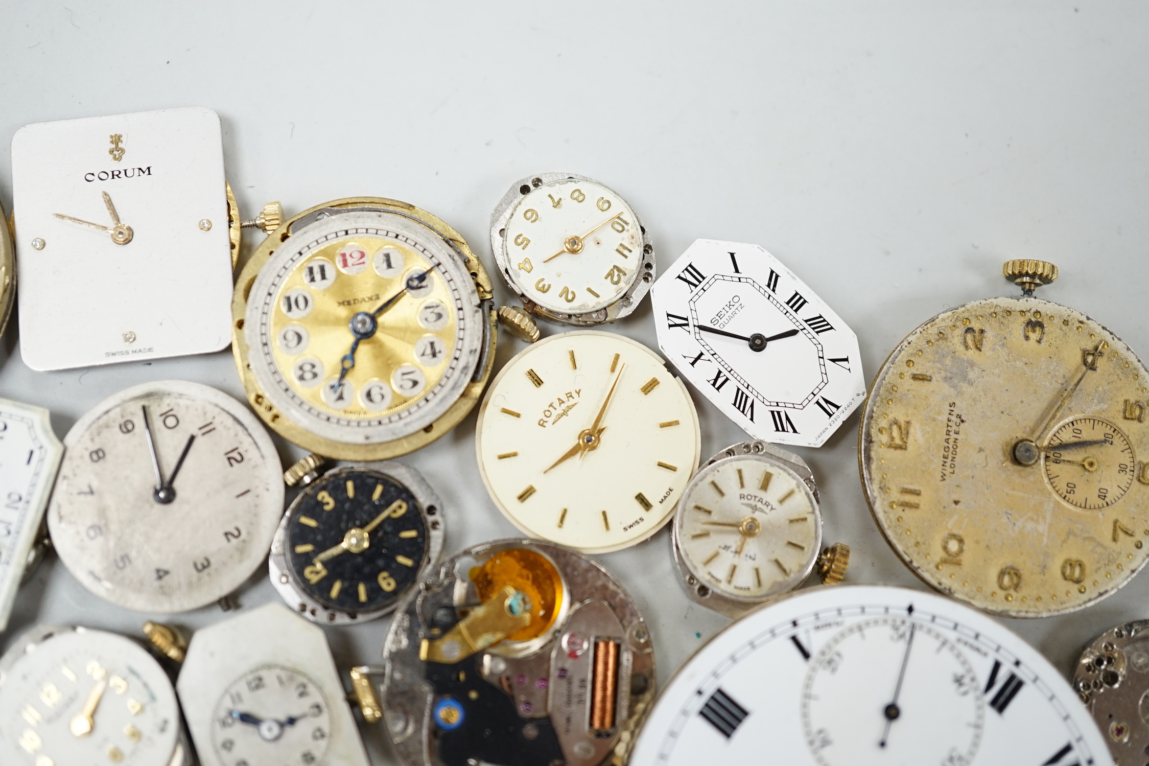 A quantity of assorted wrist and pocket watch parts and movements.